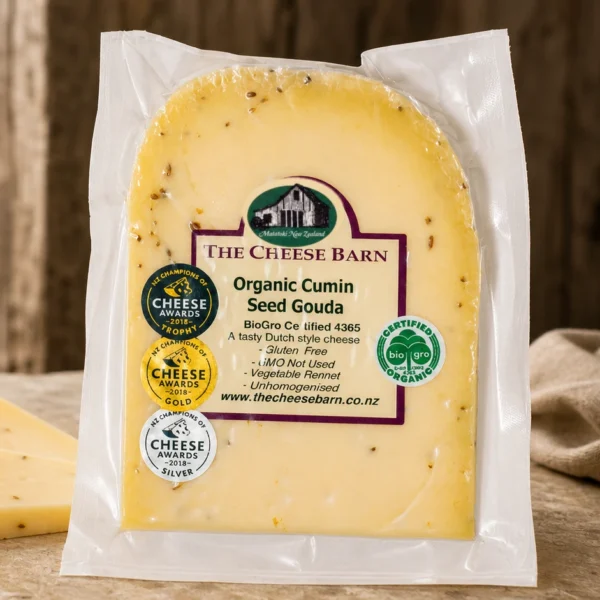 Organic Cumin Seed Gouda from The Cheese Barn at Matatoki, a tasty Dutch style certified organic gouda studded with cumin seed